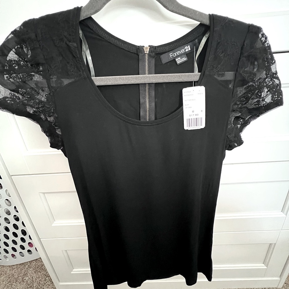 Black top with lace shoulders